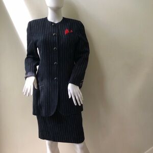 French styled, upscale, pinstripe suit NWOT. Fully lined jacket and skirt.